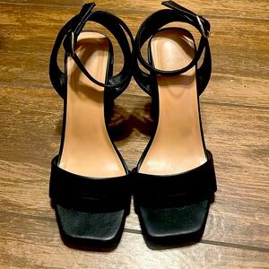 Black platform shoes, size 10.